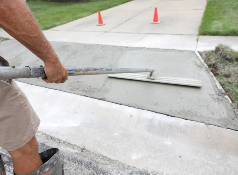 concrete driveway being installed